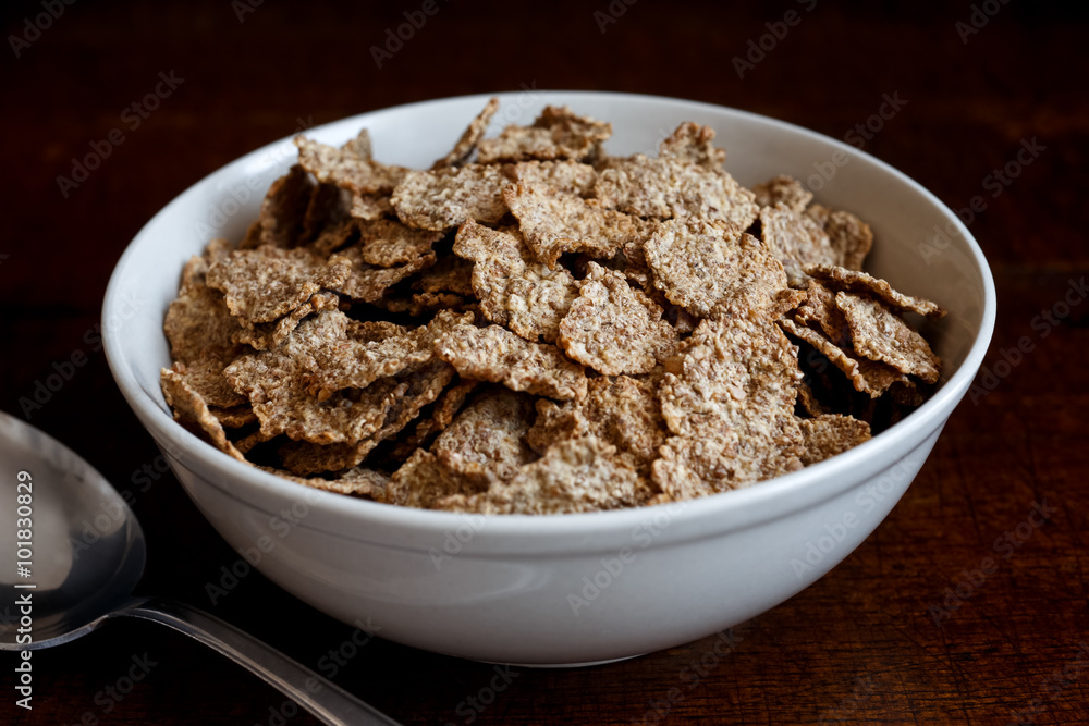 Wheat bran breakfast cereal in bowl. Wheat bran breakfast cereal in bowl.