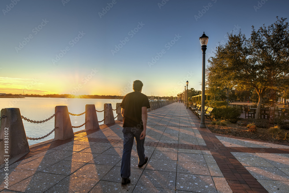 Man walking at sunset in Beaufort, South carolina