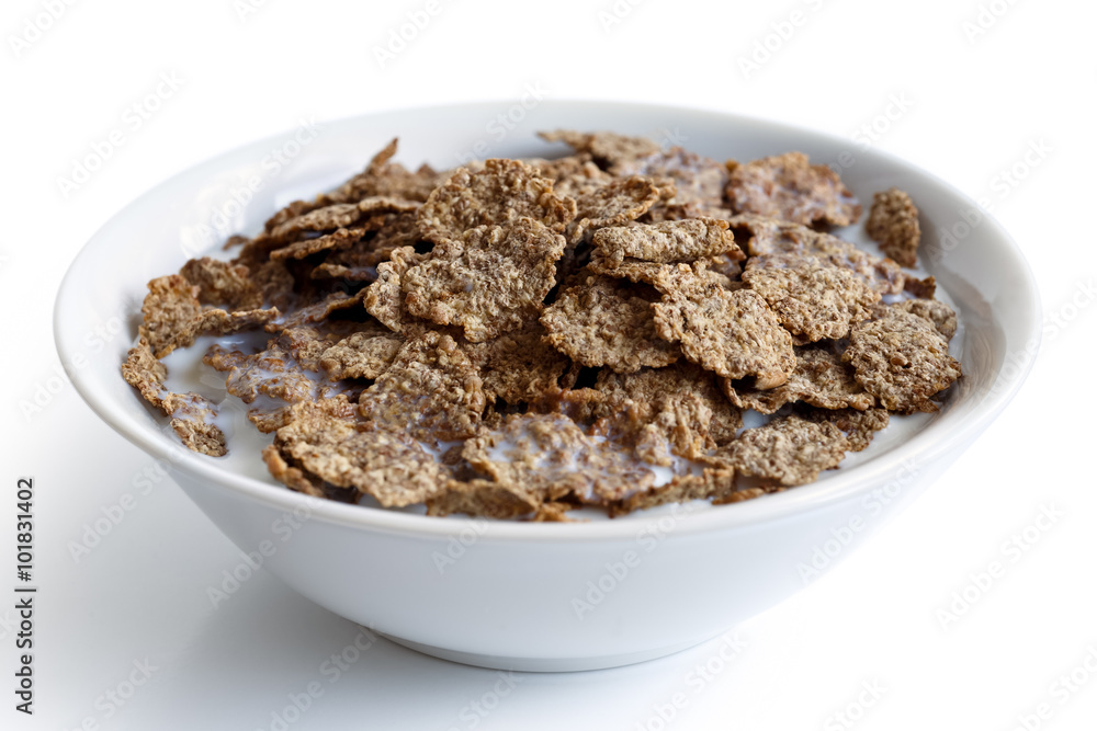 Wheat bran breakfast cereal in bowl. Wheat bran breakfast cereal in bowl.