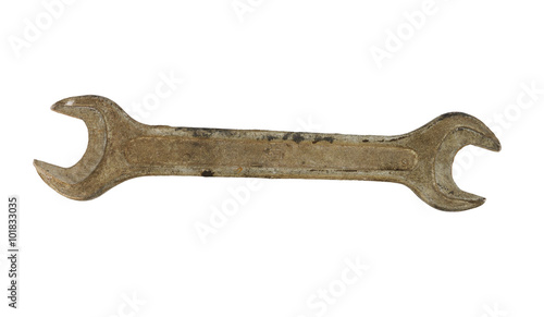 Single old rusty wrench isolated