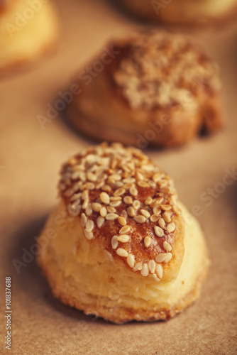 Fresh homemade salty scones with cheese and sesame