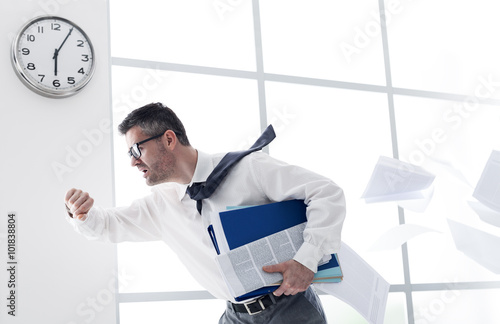 Businessman late for work photo