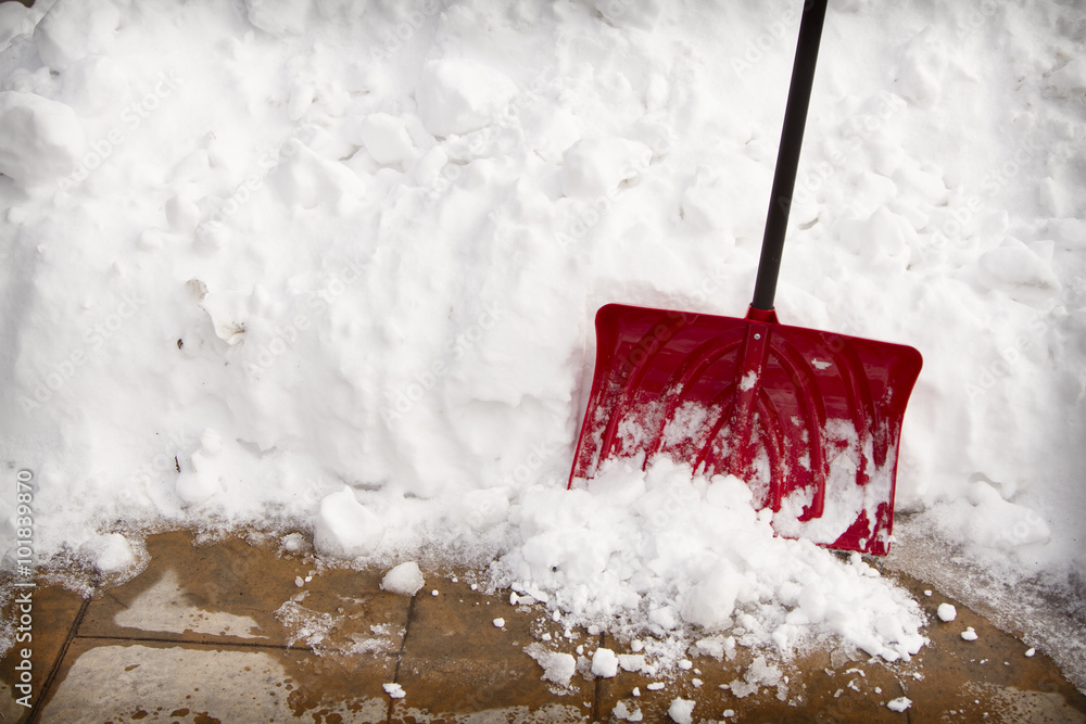 snow shovel in a snow bank