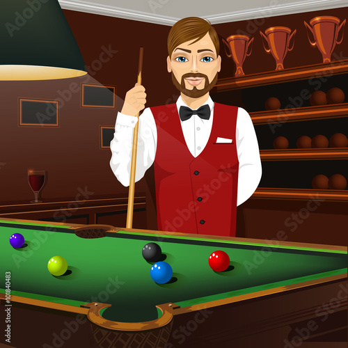 handsome caucasian man holding cue stick