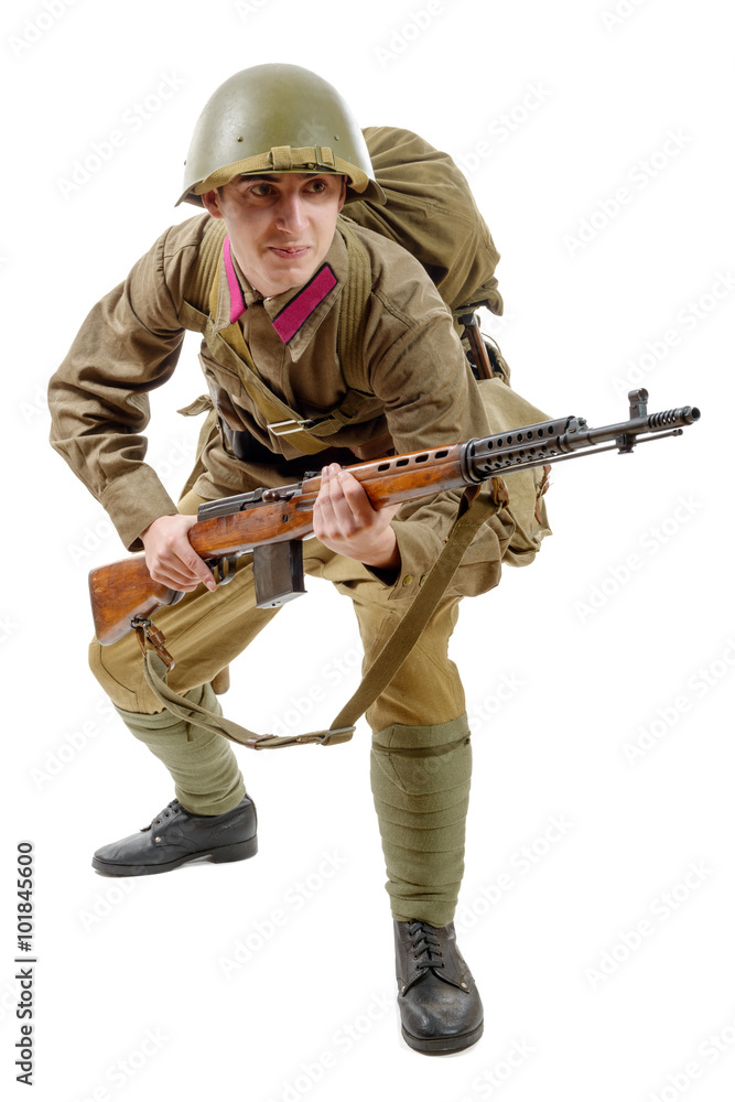 young Soviet soldier with SVT rifle on the white background young Soviet soldier with SVT rifle on the white background