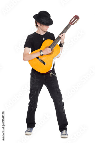 Young guitarist in hat