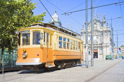 The historical trasportation of Porto - on background the "Igreja do Carmo"