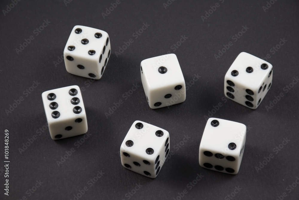 Rolled dice showing the numbers one to six Rolled dice showing the numbers one to six