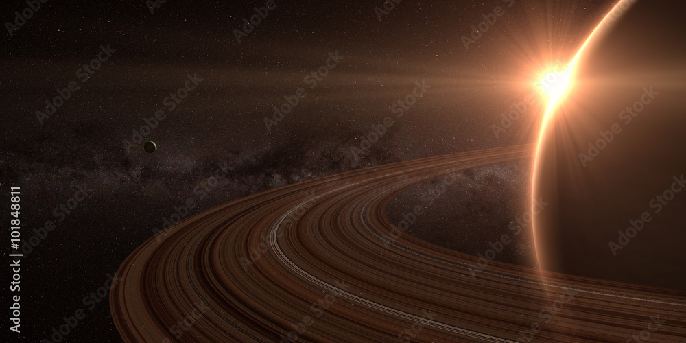 Obraz premium planeta Saturn z pierścieniami na wschód słońca na tle przestrzeni