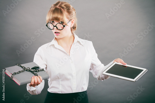 Woman with document and tablet. Digital storage. photo