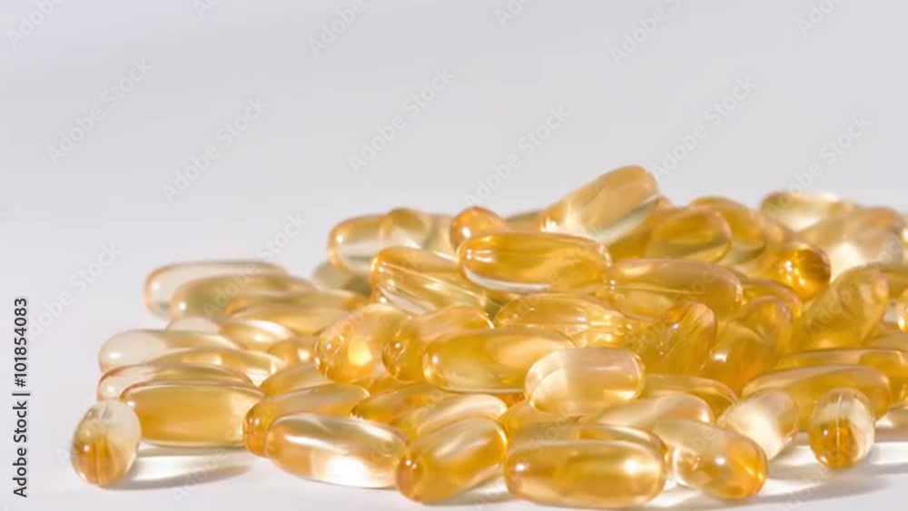 Cod fish liver oil yellow tablets dolly-shot 4k Cod fish liver oil yellow tablets dolly-shot 4k
