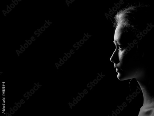 profile of sad woman photo