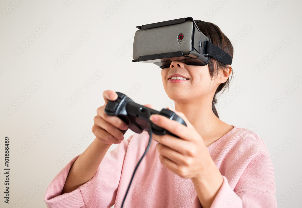 Young Woman play video game with virtual reality Young Woman play video game with virtual reality