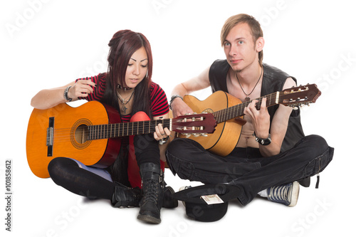 Singing musicians with guitars