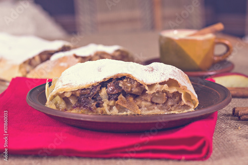Apple strudel or apple pie  with dates and cinnamon © julialototskaya