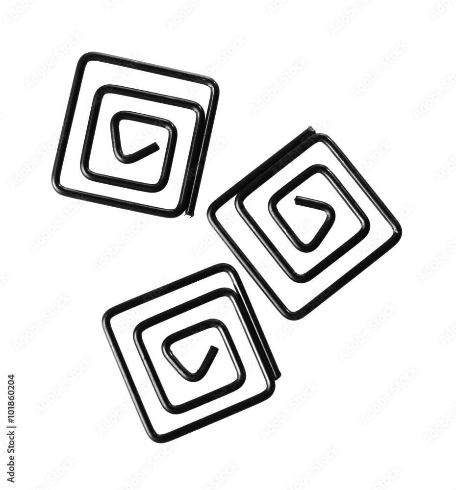 Collection of black spiral shaped paper clips, isolated on white Collection of black spiral shaped paper clips, isolated on white