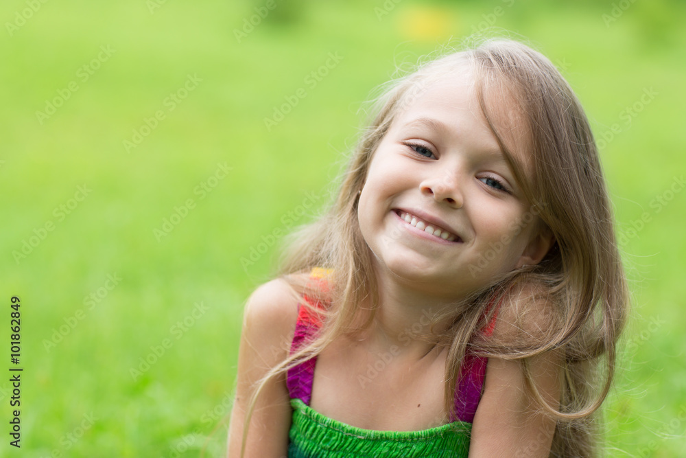 Portrait of a little girl on a green background Portrait of a little girl on a green background