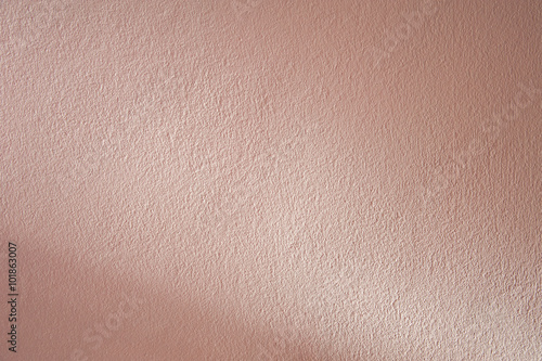 Pink wall background with shadow.