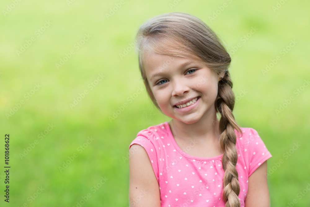 Smiling blond girl with braids Smiling blond girl with braids