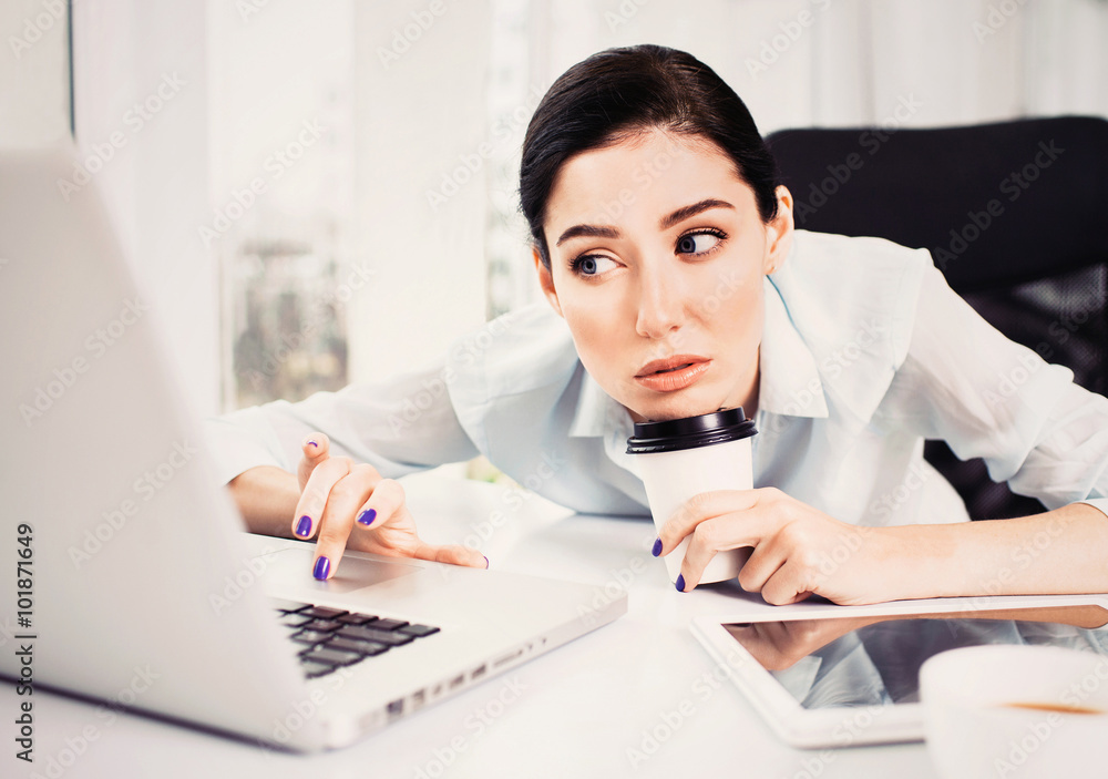 Stressed businesswoman in the office Stressed businesswoman in the office