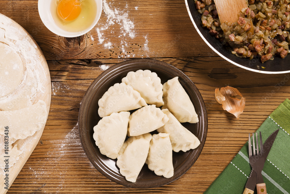Preparing homemade dumplings with onion and bacon Preparing homemade dumplings with onion and bacon