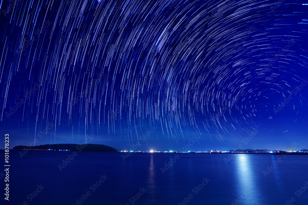 The motion beautiful star trail image during the night in the se