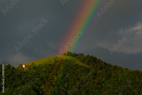 Real rainbow evening in the hills