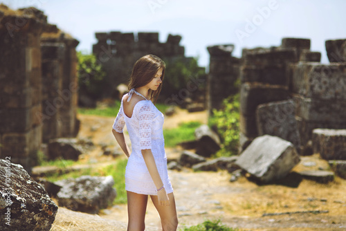 Girl among the ancient ruins © Aleksei Zakharov