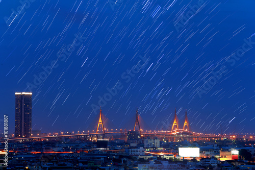 The night sky , the stars and the Tallest building in the city. photo