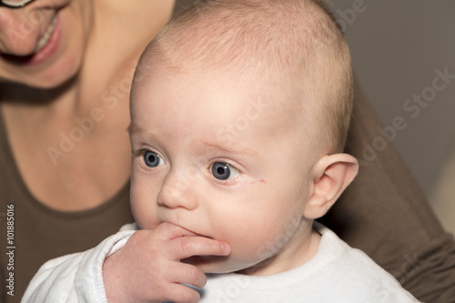 Portrait of  beaiutiful four months old baby photo