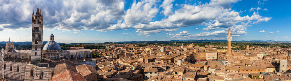 Siena, Italy panorama rooftop city view. Siena Cathedral and Mangia Tower