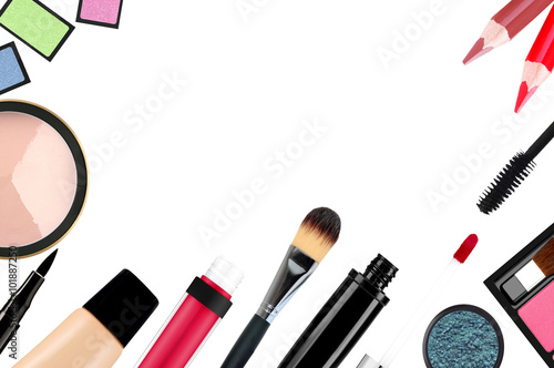 Beautiful decorative cosmetics and makeup brushes, isolated on w