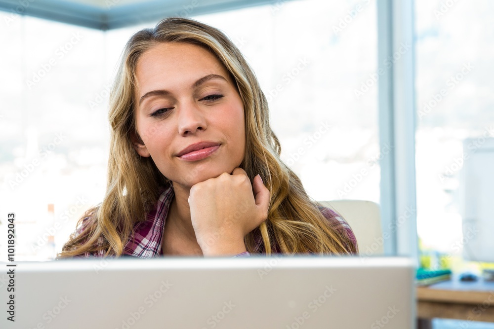 Young girl uses his computer Young girl uses his computer
