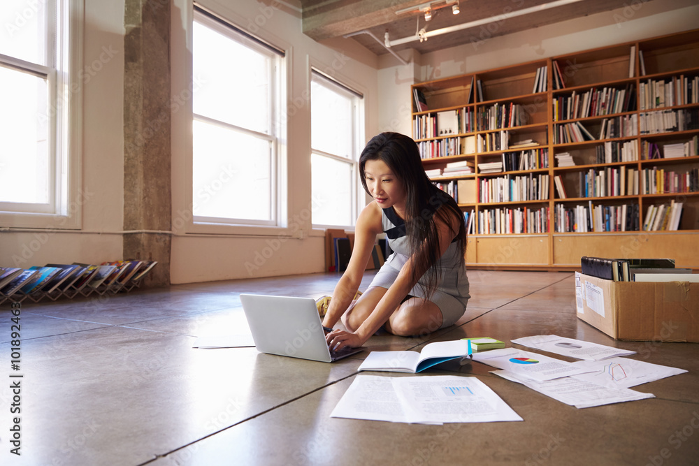 Businesswoman Laying Documents On Floor To Plan Project Businesswoman Laying Documents On Floor To Plan Project