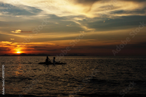 Happiness and romantic scene of couples partners canoeing.