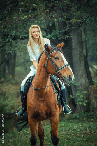 romantic sensual girl  on a horse in the forest © ruslimonchyk