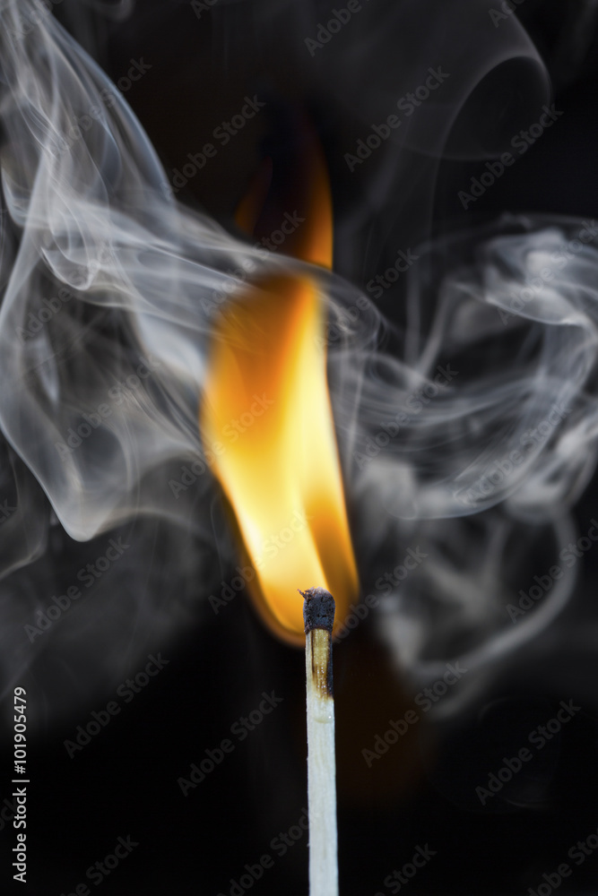 burning match with smoke on black burning match with smoke on black