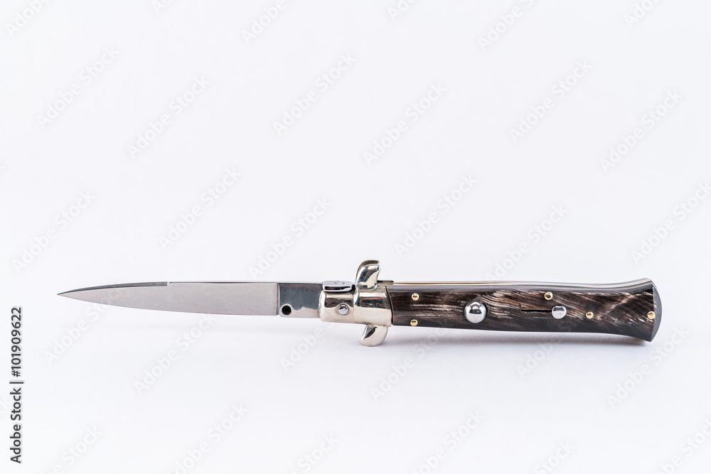 Ταπετσαρία Italian switchblade knife, horizontal position white background.