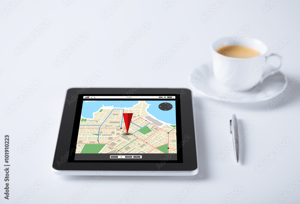 tablet pc with gps navigator map and cup of coffee tablet pc with gps navigator map and cup of coffee