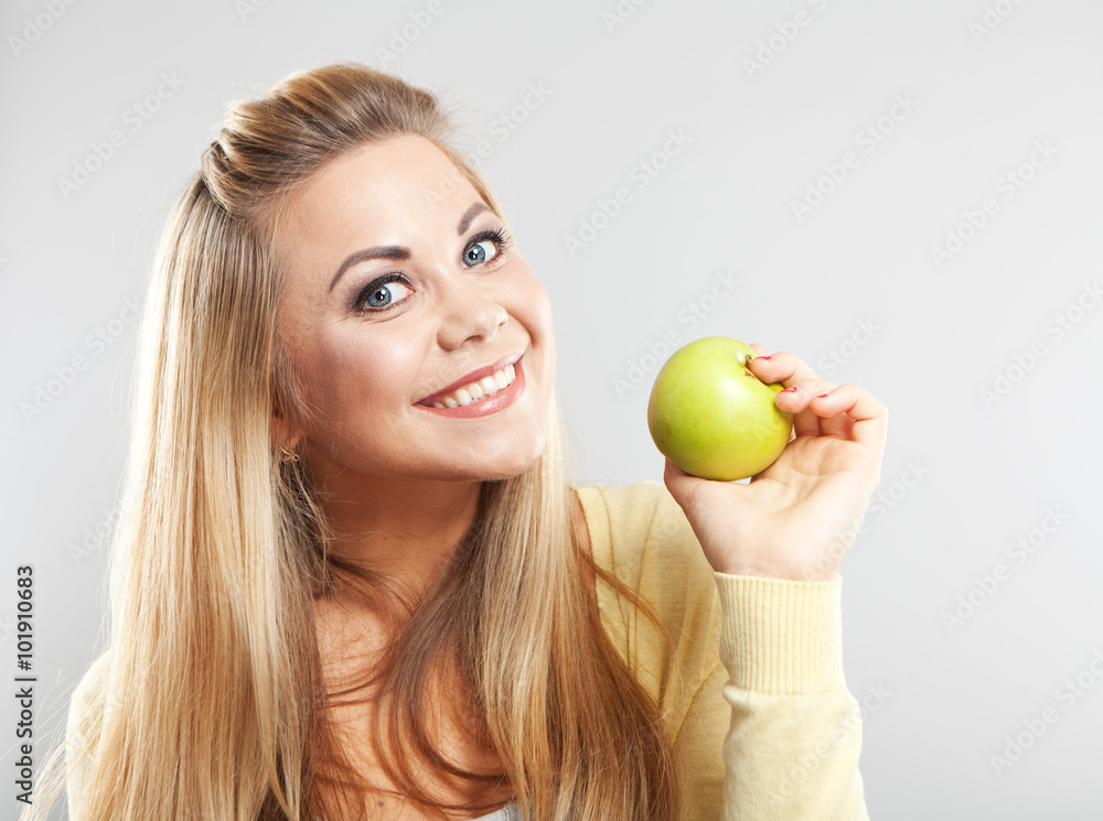 Smiling girl with green apple. Broad smile. Healthy teeth
Smiling girl with green apple. Broad smile. Healthy teeth