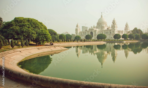 Water of pond near the structure Victoria Memorial Hall in Kolkata photo