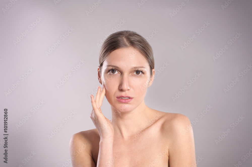 Beautiful Face of Young Woman with Clean Fresh Skin Beautiful Face of Young Woman with Clean Fresh Skin