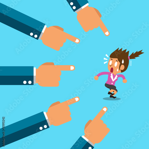 A lot of hands pointing a businesswoman