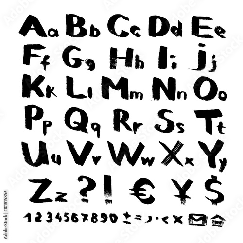 Alphabet and symbols from black brush strokes on white background