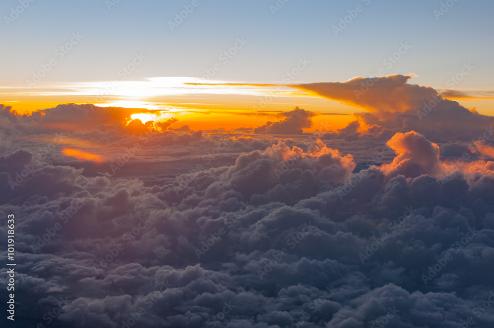 Sunrise over the clouds in the morning