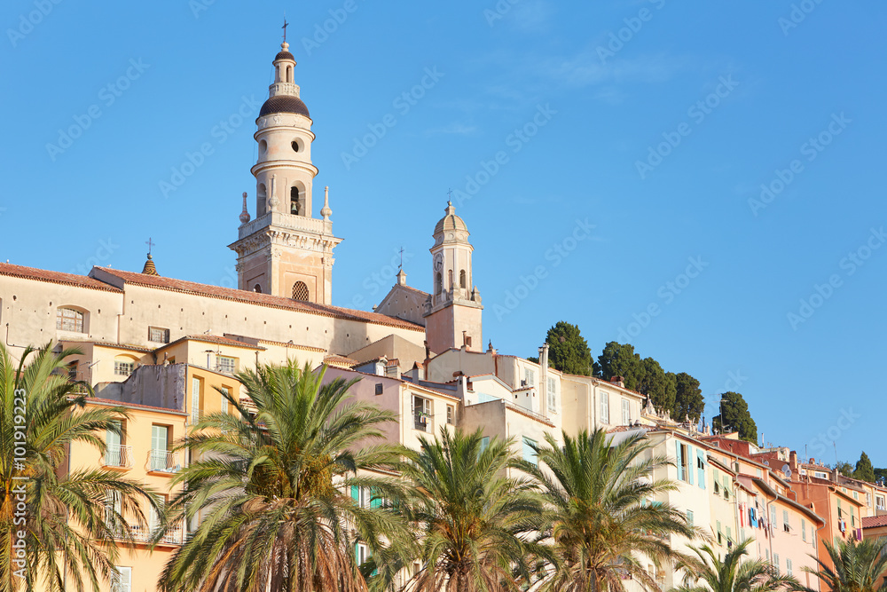 Menton bell tower and old city houses in the morning, French riviera