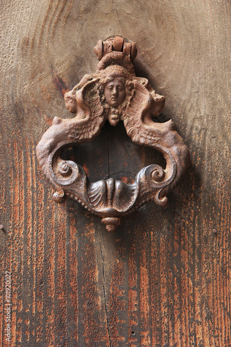 Ancient door knocker (handle). Rome, Italy