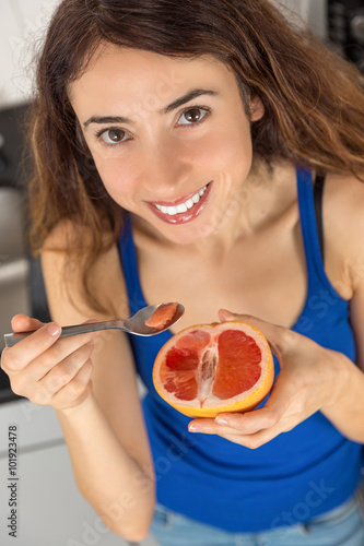 Healthy nutrition woman eating fresh fruit