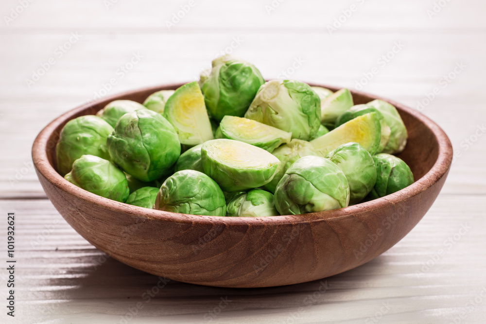 Fresh brussel sprouts over rustic wooden texture.healthy food Fresh brussel sprouts over rustic wooden texture.healthy food