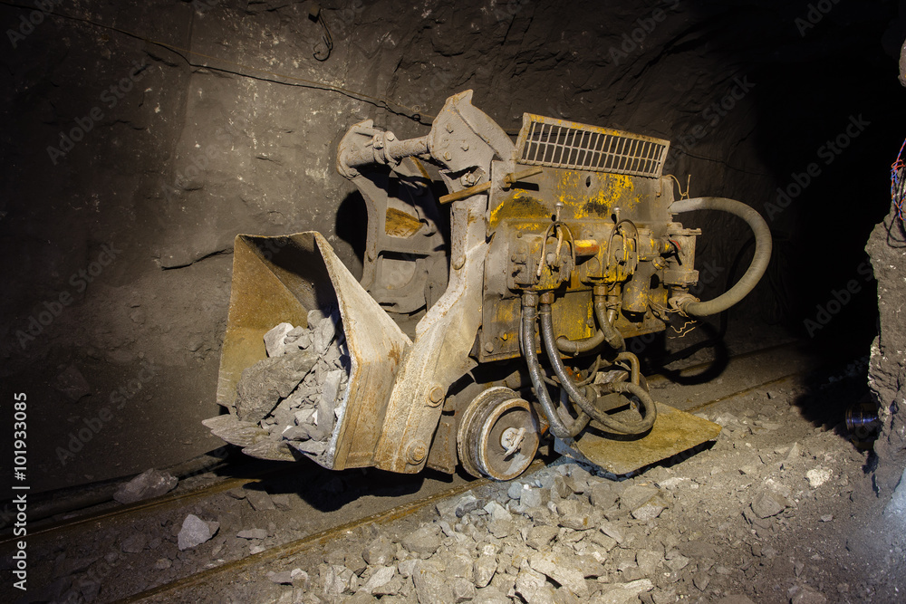 Fototapeta premium Underground gold mine ore loading machine